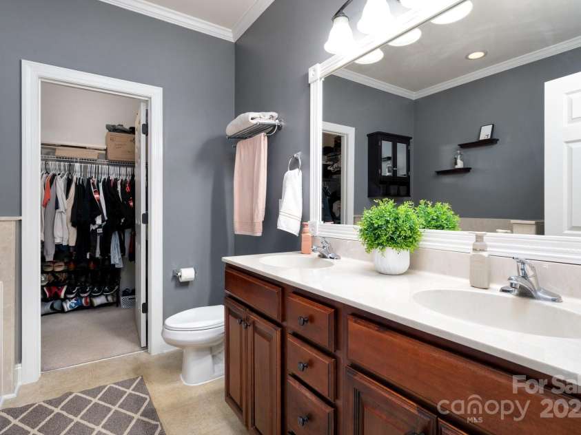 11 Dansford Lane, Arden, NC 28704.  MLS# CAR4295929, YatesRealty ID 17185. Double Vanity and Walk-In Closet In Ensuite Full Bath