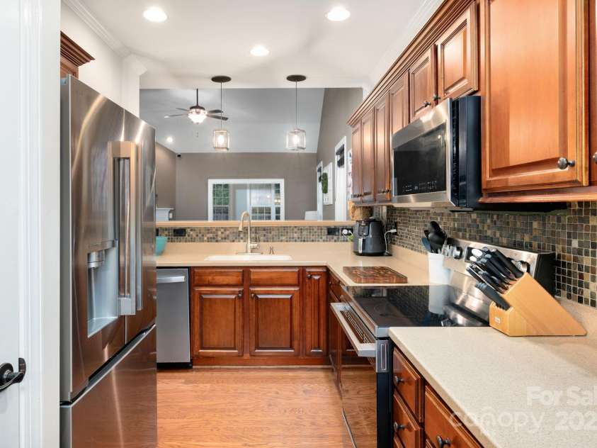 11 Dansford Lane, Arden, NC 28704.  MLS# CAR4295929, YatesRealty ID 17185. Galley Style Kitchen Great for Entertaining