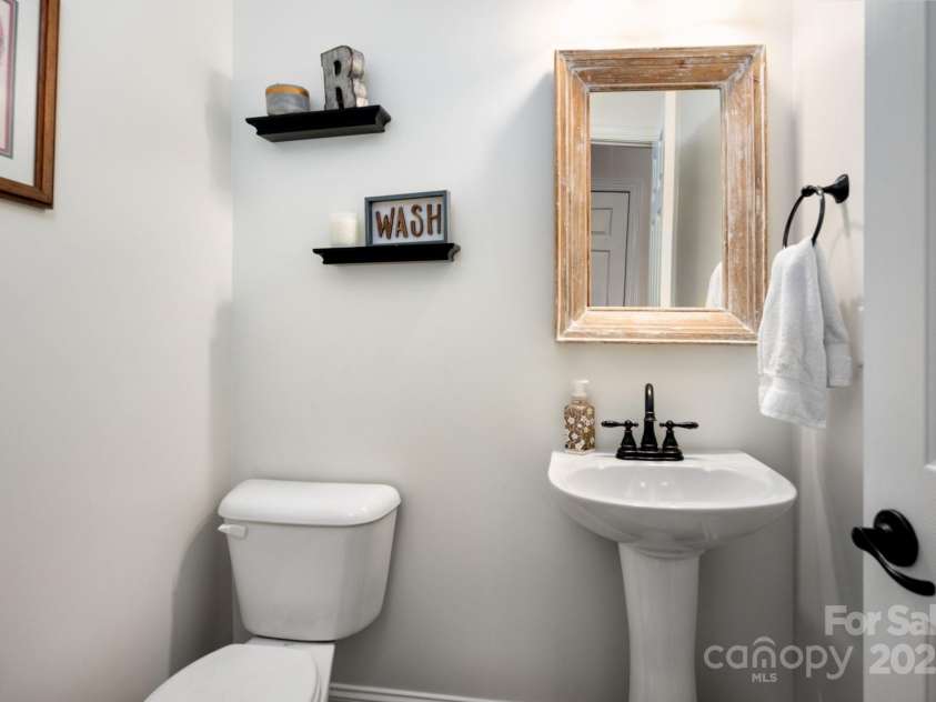 11 Dansford Lane, Arden, NC 28704.  MLS# CAR4295929, YatesRealty ID 17185. Powder Room On Main Level
