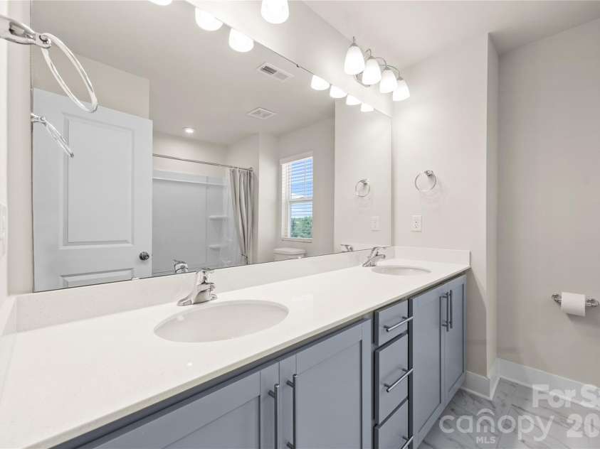 1658 Unison Drive, Charlotte, NC 28262.  MLS# CAR4374592, YatesRealty ID 17185. 
