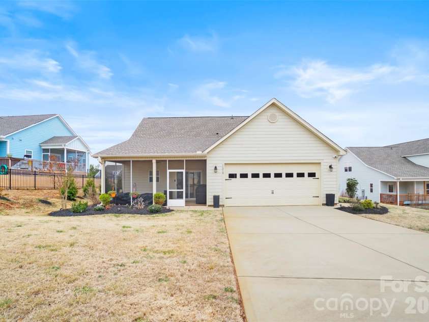 11249 Island VIew Lane, Lancaster, SC 29720.  MLS# CAR4333365, YatesRealty ID 17186. Back of home with driveway