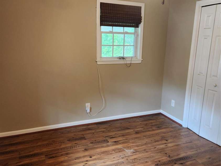 1404 Mauney Avenue, Gastonia, NC 28052.  MLS# CAR4374899, YatesRealty ID 17187. Back bedroom 11' x 15'