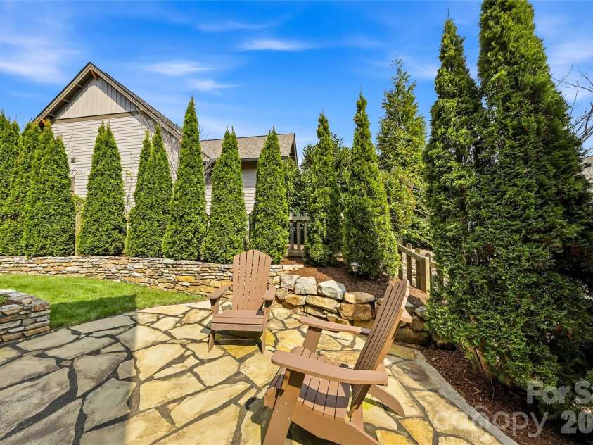 30 Stills Creek Loop, Fairview, NC 28730.  MLS# CAR4353771, YatesRealty ID 17188. Back patio