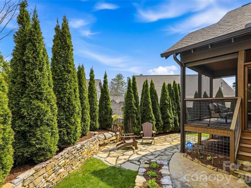 30 Stills Creek Loop, Fairview, NC 28730.  MLS# CAR4353771, YatesRealty ID 17188. Back patio