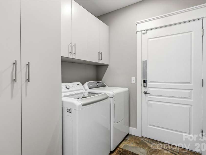 30 Stills Creek Loop, Fairview, NC 28730.  MLS# CAR4353771, YatesRealty ID 17188. Main level laundry