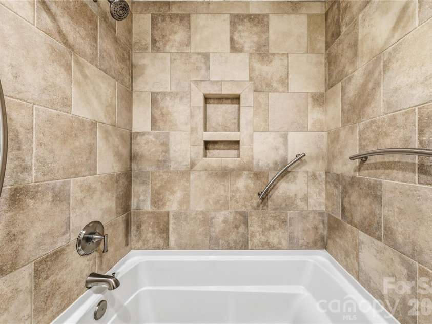 30 Stills Creek Loop, Fairview, NC 28730.  MLS# CAR4353771, YatesRealty ID 17188. Upstairs guest bath shower