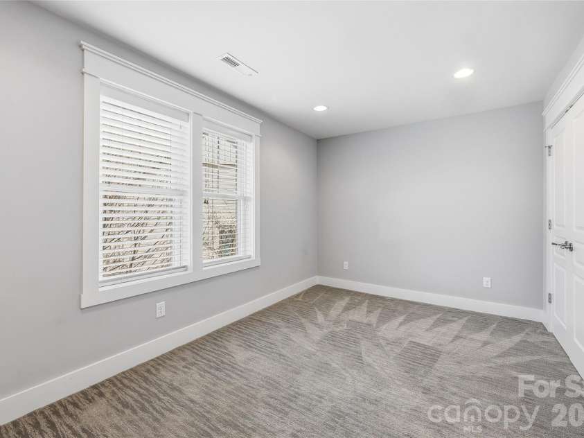 30 Stills Creek Loop, Fairview, NC 28730.  MLS# CAR4353771, YatesRealty ID 17188. Upstairs guest room