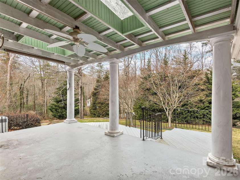 110 Glengary Drive, Flat Rock, NC 28731.  MLS# CAR4351379, YatesRealty ID 17194. Covered Porch off Kitchen/Breakfast Room