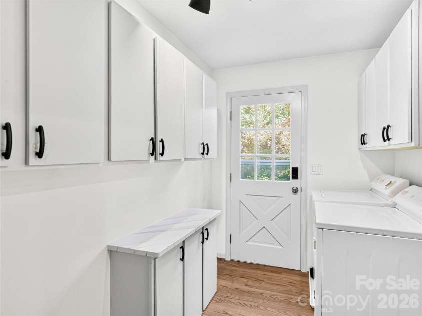 110 Glengary Drive, Flat Rock, NC 28731.  MLS# CAR4351379, YatesRealty ID 17194. Laundry Room off Kitchen