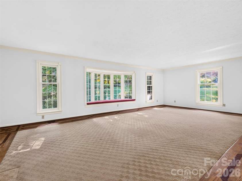 110 Glengary Drive, Flat Rock, NC 28731.  MLS# CAR4351379, YatesRealty ID 17194. Lovely Oversized Living Room