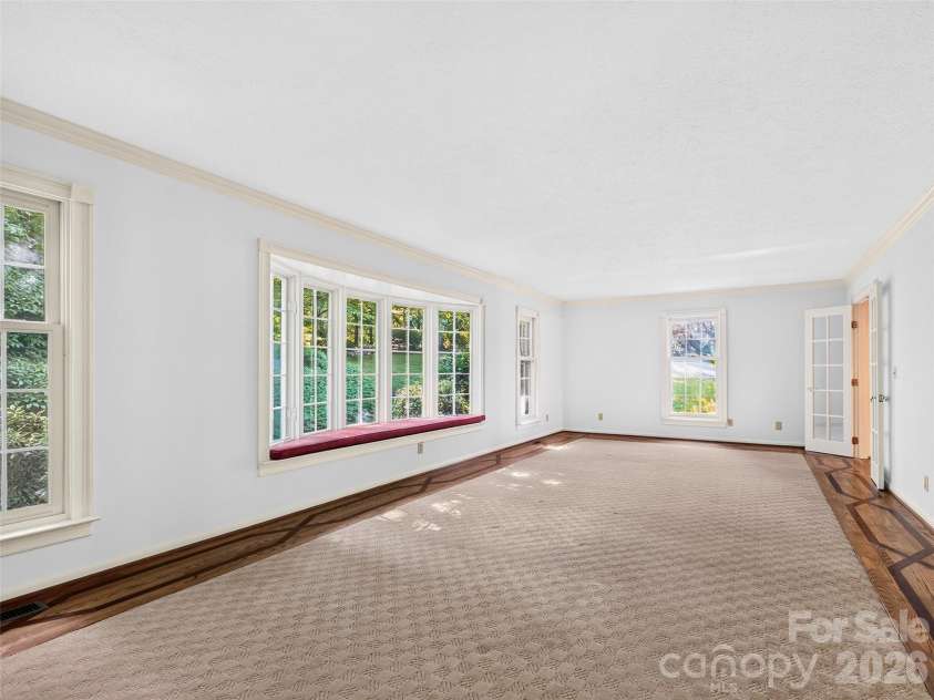 110 Glengary Drive, Flat Rock, NC 28731.  MLS# CAR4351379, YatesRealty ID 17194. Lovely Oversized Living Room
