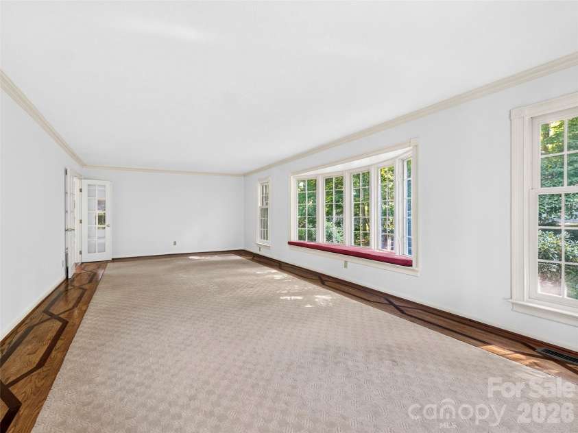 110 Glengary Drive, Flat Rock, NC 28731.  MLS# CAR4351379, YatesRealty ID 17194. Lovely Oversized Living Room