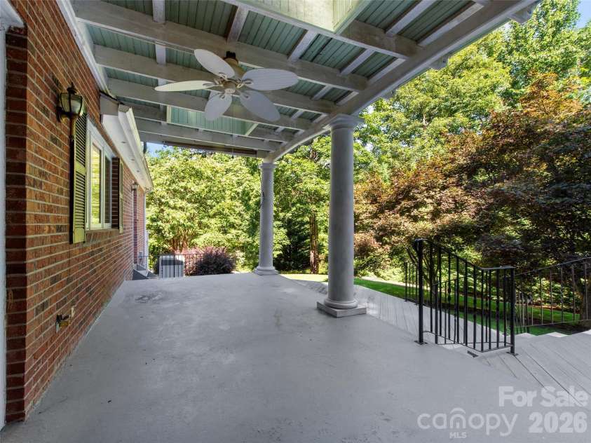 110 Glengary Drive, Flat Rock, NC 28731.  MLS# CAR4351379, YatesRealty ID 17194. Porch off Kitchen