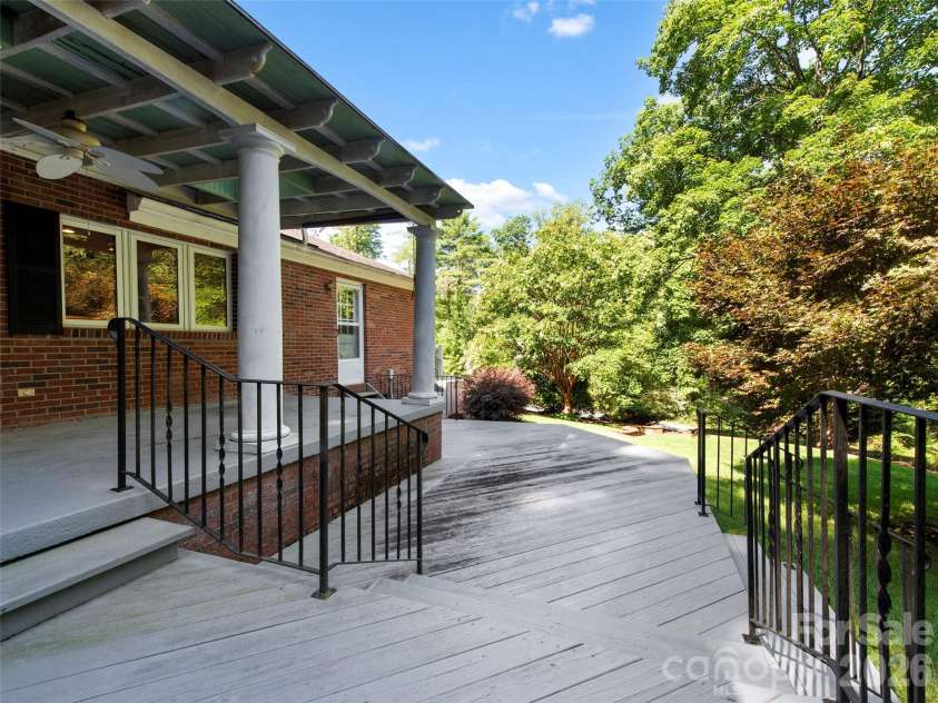 110 Glengary Drive, Flat Rock, NC 28731.  MLS# CAR4351379, YatesRealty ID 17194. Porch off Kitchen