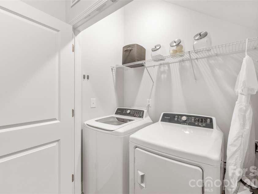 411 Belton Street, Charlotte, NC 28209.  MLS# CAR4321222, YatesRealty ID 17202. Laundry day made easy! Located on the first floor for ultimate convenience.