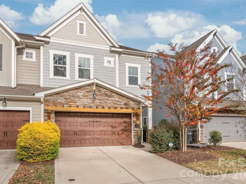 411 Belton Street, Charlotte, NC 28209.  MLS# CAR4321222, YatesRealty ID 17202. Spacious 2-car garage with sleek epoxy floors — durable and ready for your next project.