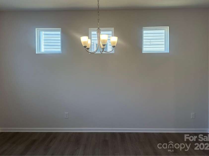 6009 Jasmine Branch Road, Charlotte, NC 28216.  MLS# CAR4261490, YatesRealty ID 17210. Suwanee Dining Room