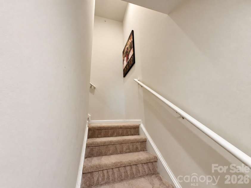 5356 Austin Knoll Court, Charlotte, NC 28269.  MLS# CAR4430727, YatesRealty ID 17213. Bottom Stairs