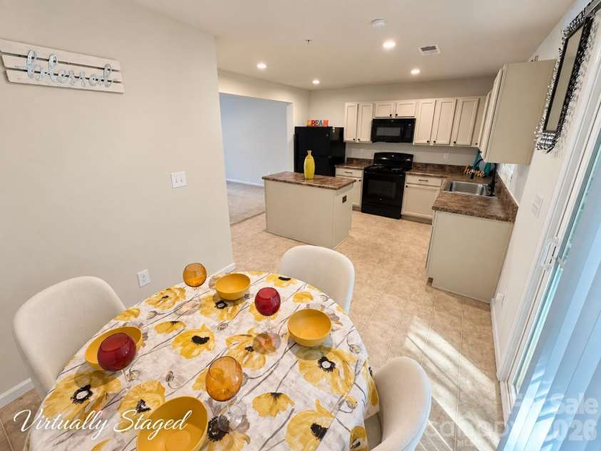 5356 Austin Knoll Court, Charlotte, NC 28269.  MLS# CAR4430727, YatesRealty ID 17213. Eat-in Kitchen (virtually staged)