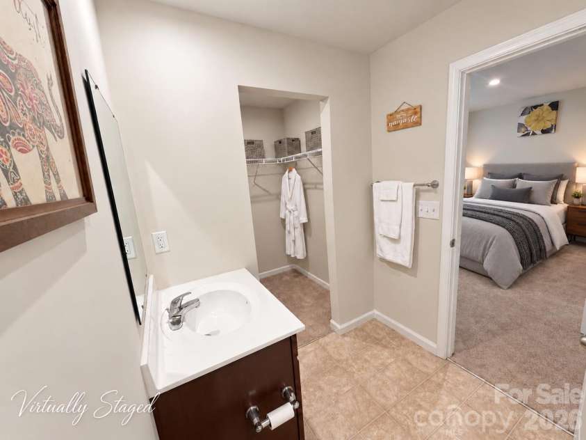 5356 Austin Knoll Court, Charlotte, NC 28269.  MLS# CAR4430727, YatesRealty ID 17213. Primary Ensuite & Walk-in Closet (virtually staged)