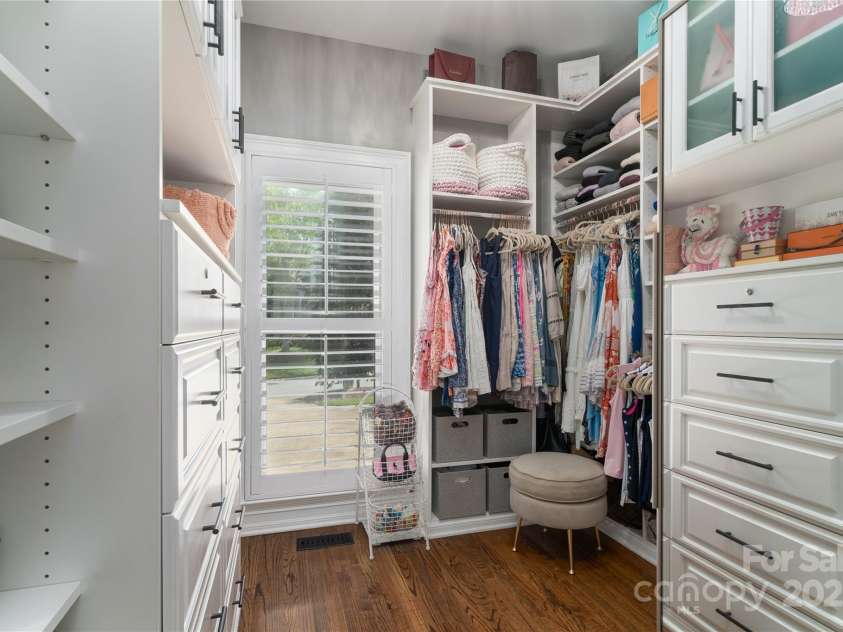 7600 Dunsmuir Court, Cornelius, NC 28031.  MLS# CAR4265951, YatesRealty ID 17217. Custom closet in primary