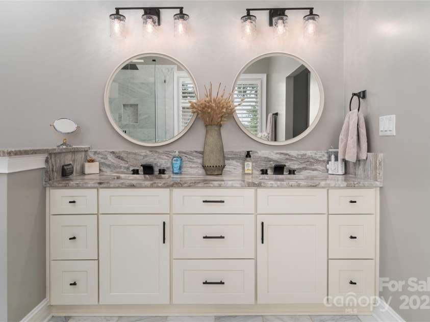 7600 Dunsmuir Court, Cornelius, NC 28031.  MLS# CAR4265951, YatesRealty ID 17217. Dual Sink Vanity