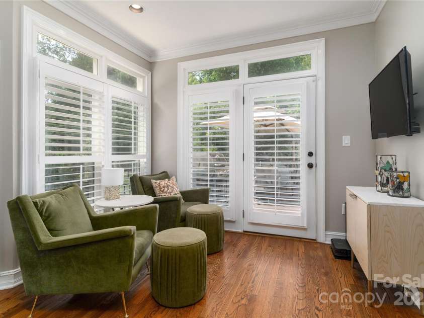 7600 Dunsmuir Court, Cornelius, NC 28031.  MLS# CAR4265951, YatesRealty ID 17217. Gathering room off Kitchen walks out to deck