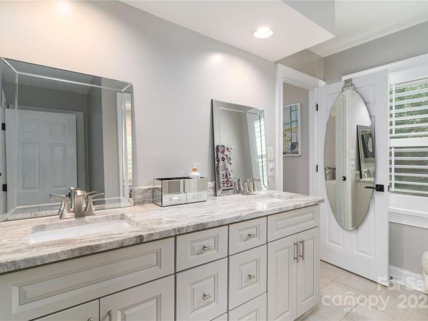 7600 Dunsmuir Court, Cornelius, NC 28031.  MLS# CAR4265951, YatesRealty ID 17217. Jack and Jill bath upstairs