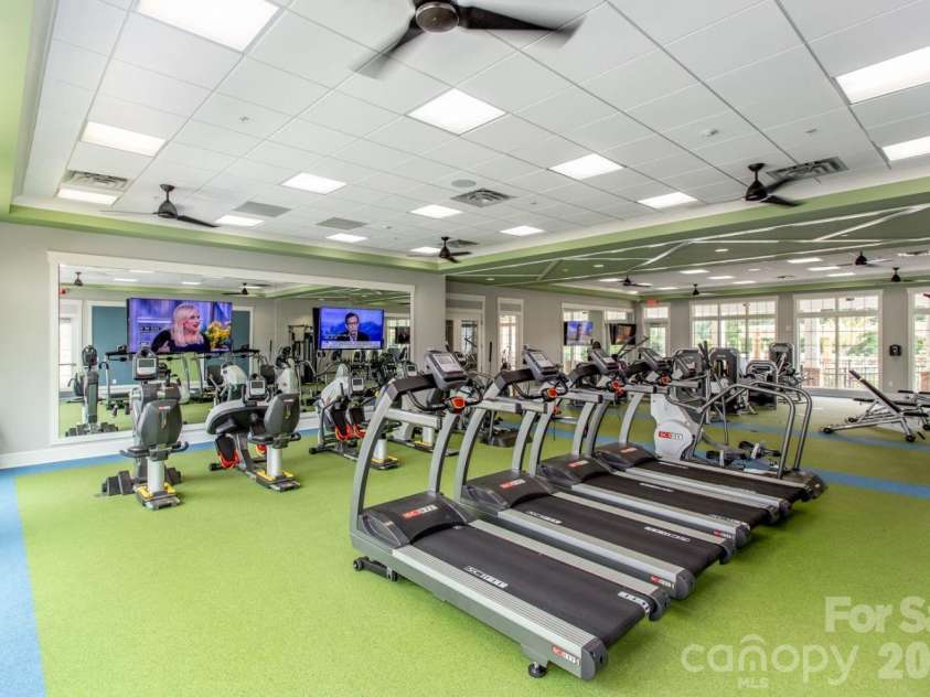 13222 Cozy Court, Charlotte, NC 28215.  MLS# CAR4362371, YatesRealty ID 17222. Fully equipped fitness center featuring a variety of cardio and strength-training equipment.