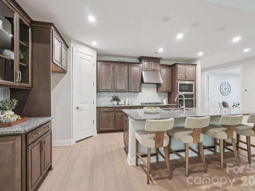 13222 Cozy Court, Charlotte, NC 28215.  MLS# CAR4362371, YatesRealty ID 17222. Kitchen details showcasing modern finishes and thoughtful design.