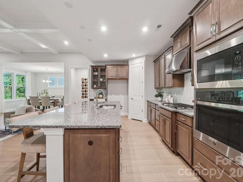 13222 Cozy Court, Charlotte, NC 28215.  MLS# CAR4362371, YatesRealty ID 17222. Kitchen with a clean, open feel that integrates seamlessly with the home’s layout.