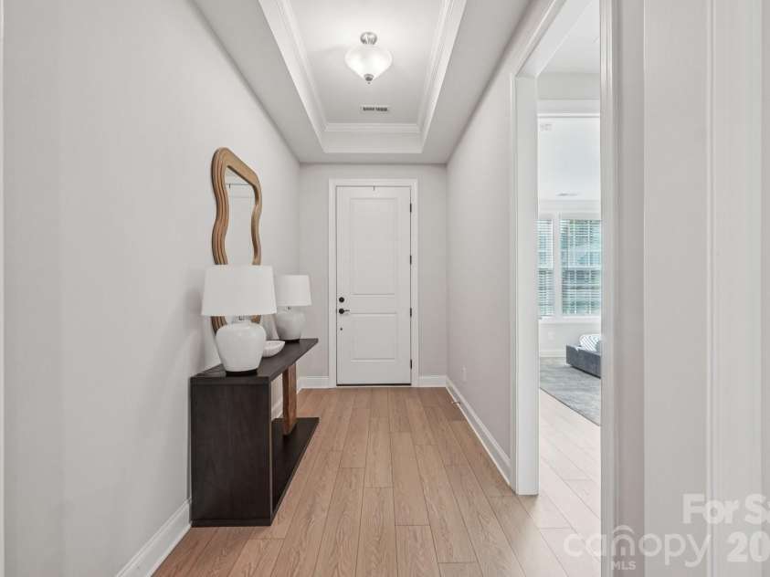 13222 Cozy Court, Charlotte, NC 28215.  MLS# CAR4362371, YatesRealty ID 17222. Light-filled foyer offering a seamless transition into the main living areas.