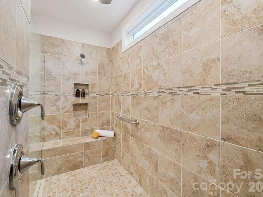 13222 Cozy Court, Charlotte, NC 28215.  MLS# CAR4362371, YatesRealty ID 17222. Thoughtfully designed primary bathroom with a balance of style and functionality.