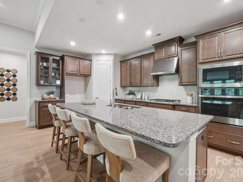 13222 Cozy Court, Charlotte, NC 28215.  MLS# CAR4362371, YatesRealty ID 17222. Well-appointed kitchen featuring generous counter space and a functional layout.