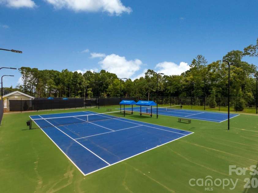 13222 Cozy Court, Charlotte, NC 28215.  MLS# CAR4362371, YatesRealty ID 17222. Well-maintained tennis courts designed for both casual play and competitive matches.