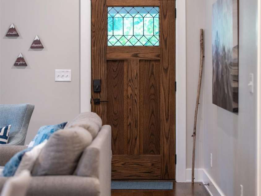 328 Mccoy Cove Road, Black Mountain, NC 28711.  MLS# CAR4248740, YatesRealty ID 17223. Custom made white oak door with handcrafted leaded window