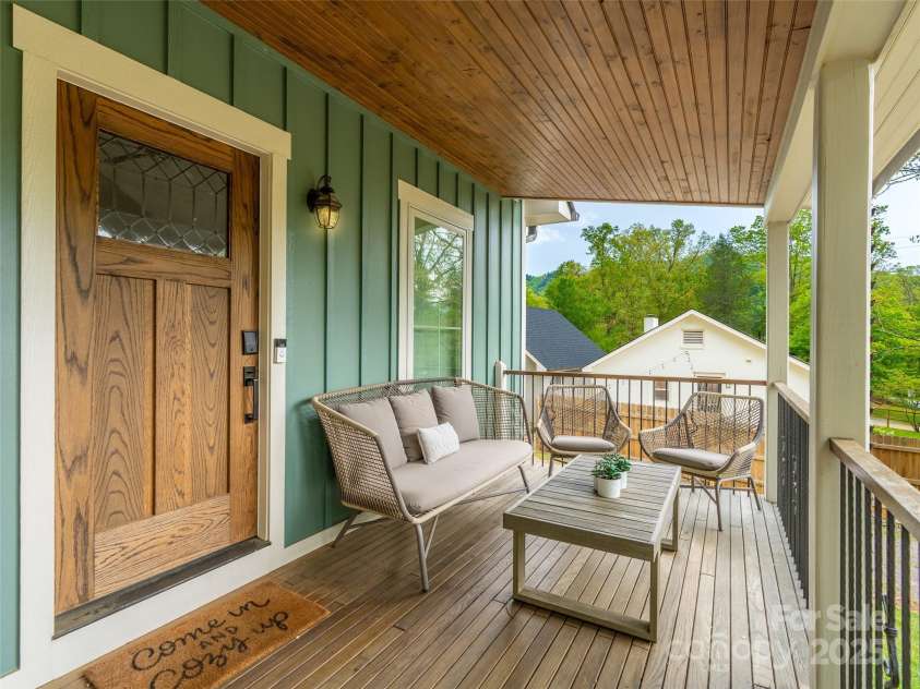 328 Mccoy Cove Road, Black Mountain, NC 28711.  MLS# CAR4248740, YatesRealty ID 17223. Custom made white Oak door with locally crafted stained glass.