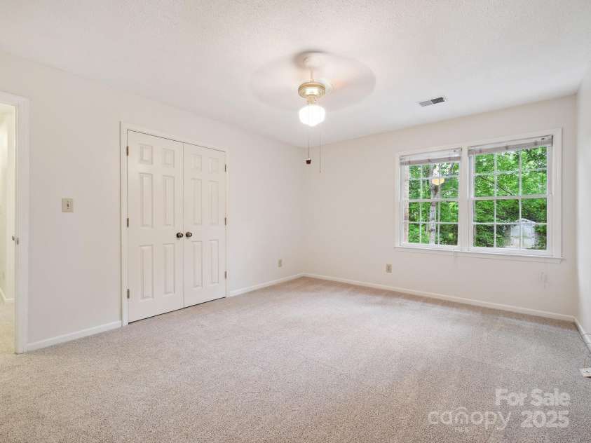 3017 Butter Churn Lane, Matthews, NC 28105.  MLS# CAR4251360, YatesRealty ID 17246. Bedroom 2