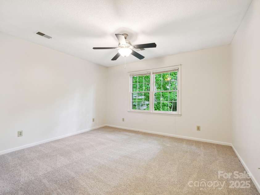 3017 Butter Churn Lane, Matthews, NC 28105.  MLS# CAR4251360, YatesRealty ID 17246. Bedroom 3