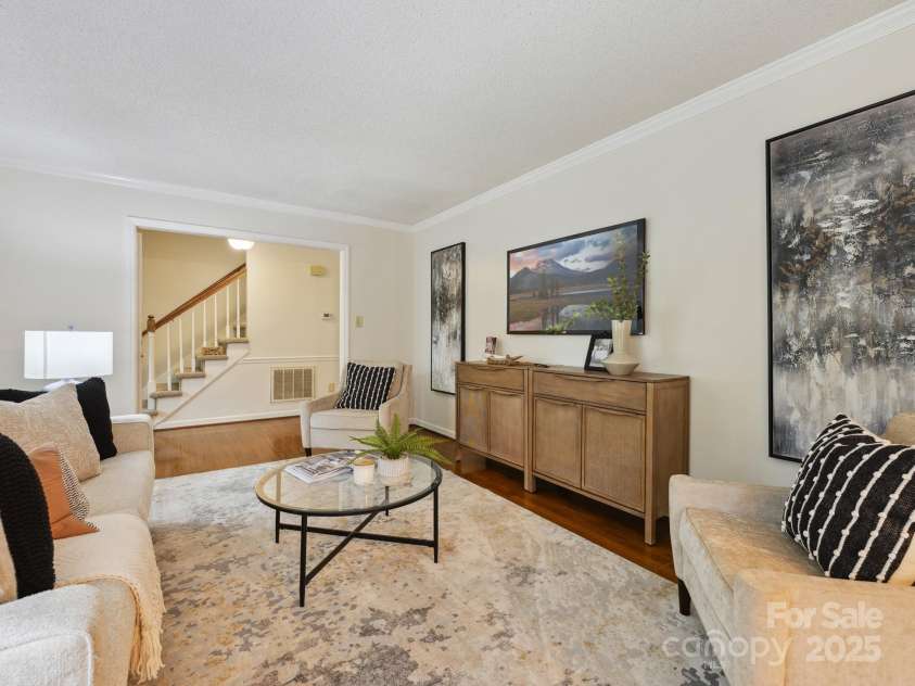3017 Butter Churn Lane, Matthews, NC 28105.  MLS# CAR4251360, YatesRealty ID 17246. Living Room