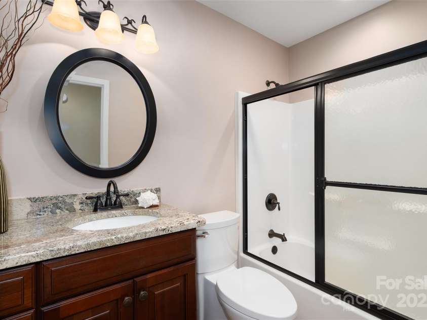 54 Lake Pointe Circle, Hendersonville, NC 28792.  MLS# CAR4323062, YatesRealty ID 1725. Main level hallway bathroom