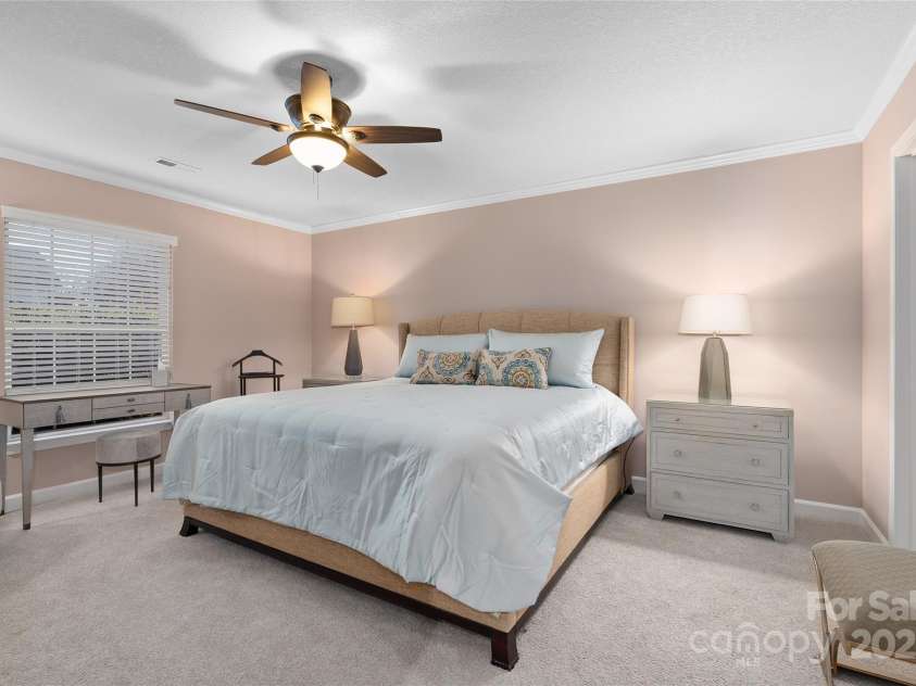 54 Lake Pointe Circle, Hendersonville, NC 28792.  MLS# CAR4323062, YatesRealty ID 1725. Main level primary bedroom