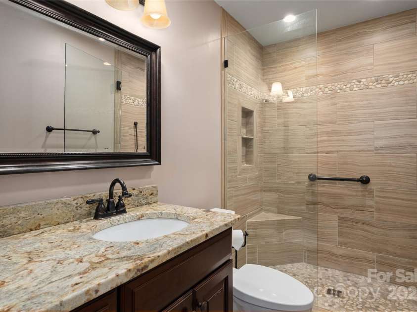 54 Lake Pointe Circle, Hendersonville, NC 28792.  MLS# CAR4323062, YatesRealty ID 1725. Primary bathroom