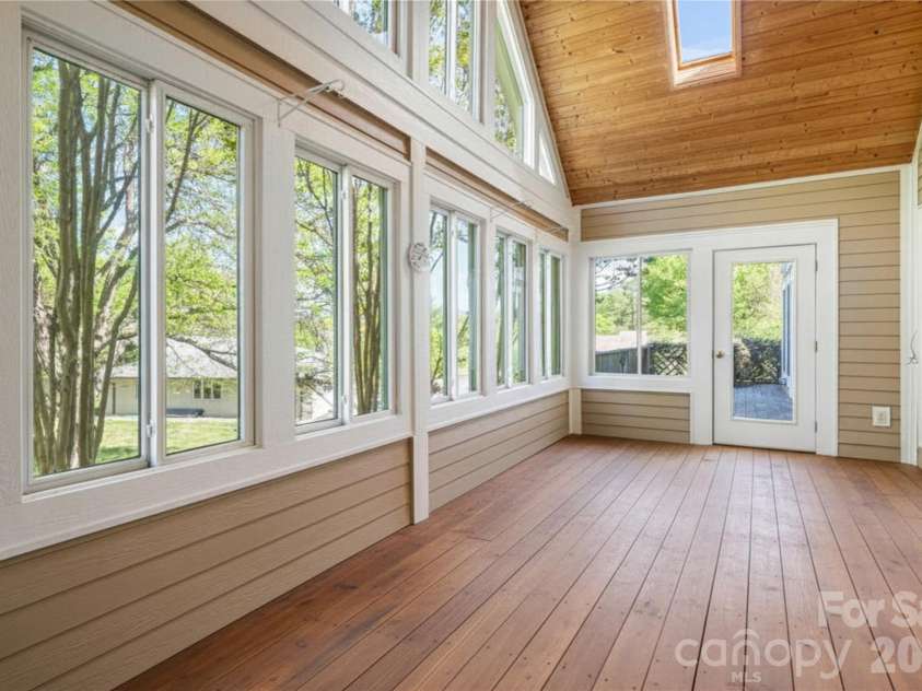 7 Ashley Road, Asheville, NC 28805.  MLS# CAR4370174, YatesRealty ID 17250. Sunroom Across From Den