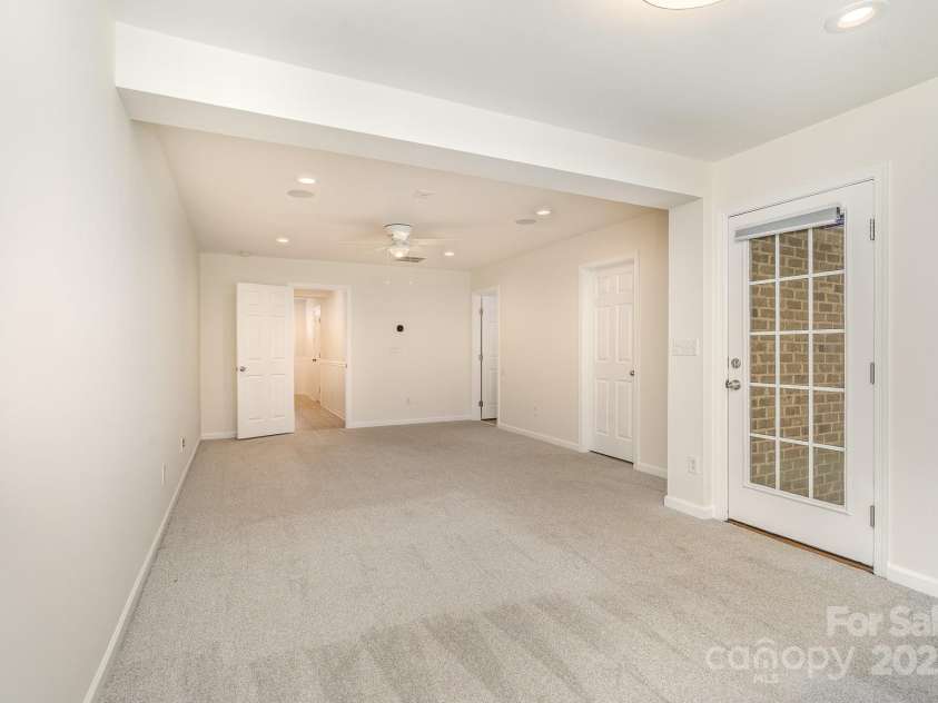 243 Lincoln Street, Charlotte, NC 28203.  MLS# CAR4259345, YatesRealty ID 17251. 1st Floor Multi-Purpose Room-Door to patio
