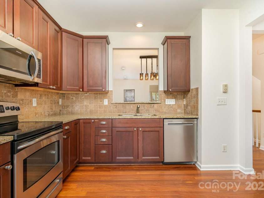 243 Lincoln Street, Charlotte, NC 28203.  MLS# CAR4259345, YatesRealty ID 17251. 2nd Floor Kitchen-Newer SS Appliances-Granite Countertops