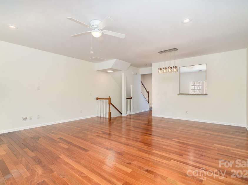 243 Lincoln Street, Charlotte, NC 28203.  MLS# CAR4259345, YatesRealty ID 17251. 2nd Floor Living Room (19'x22')- Wood Floors