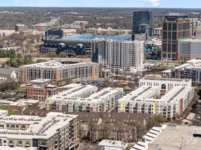 243 Lincoln Street, Charlotte, NC 28203.  MLS# CAR4259345, YatesRealty ID 17251. Drone Aerial View Of Uptown & Bank of America Stadium nearby
