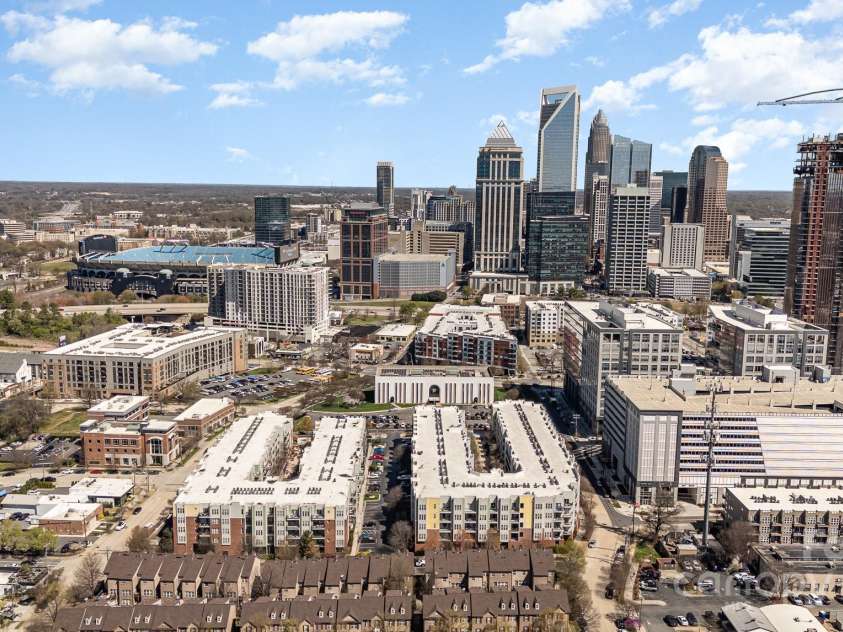 243 Lincoln Street, Charlotte, NC 28203.  MLS# CAR4259345, YatesRealty ID 17251. Drone Aerial View of Uptown & BOA Stadium