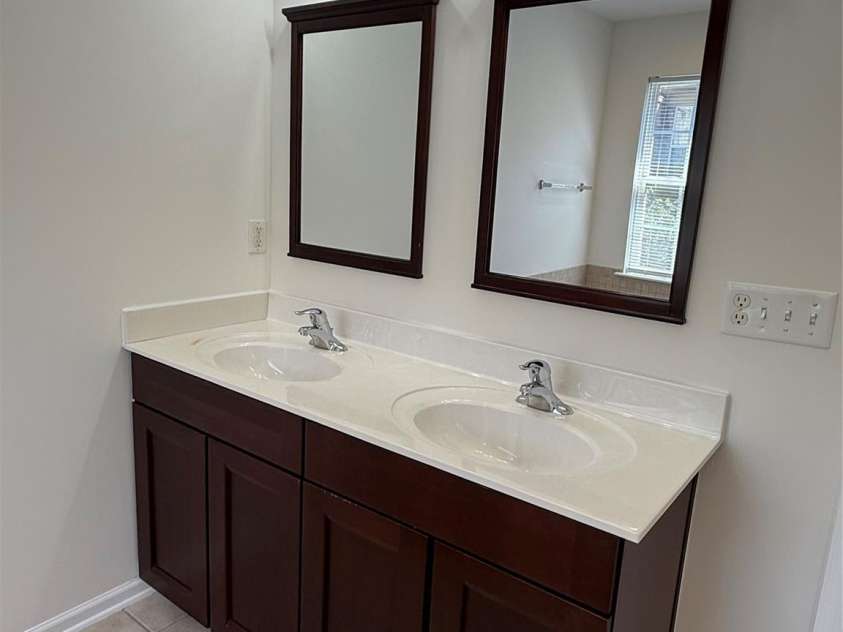 243 Lincoln Street, Charlotte, NC 28203.  MLS# CAR4259345, YatesRealty ID 17251. Primary Bath Vanity -Double Sinks